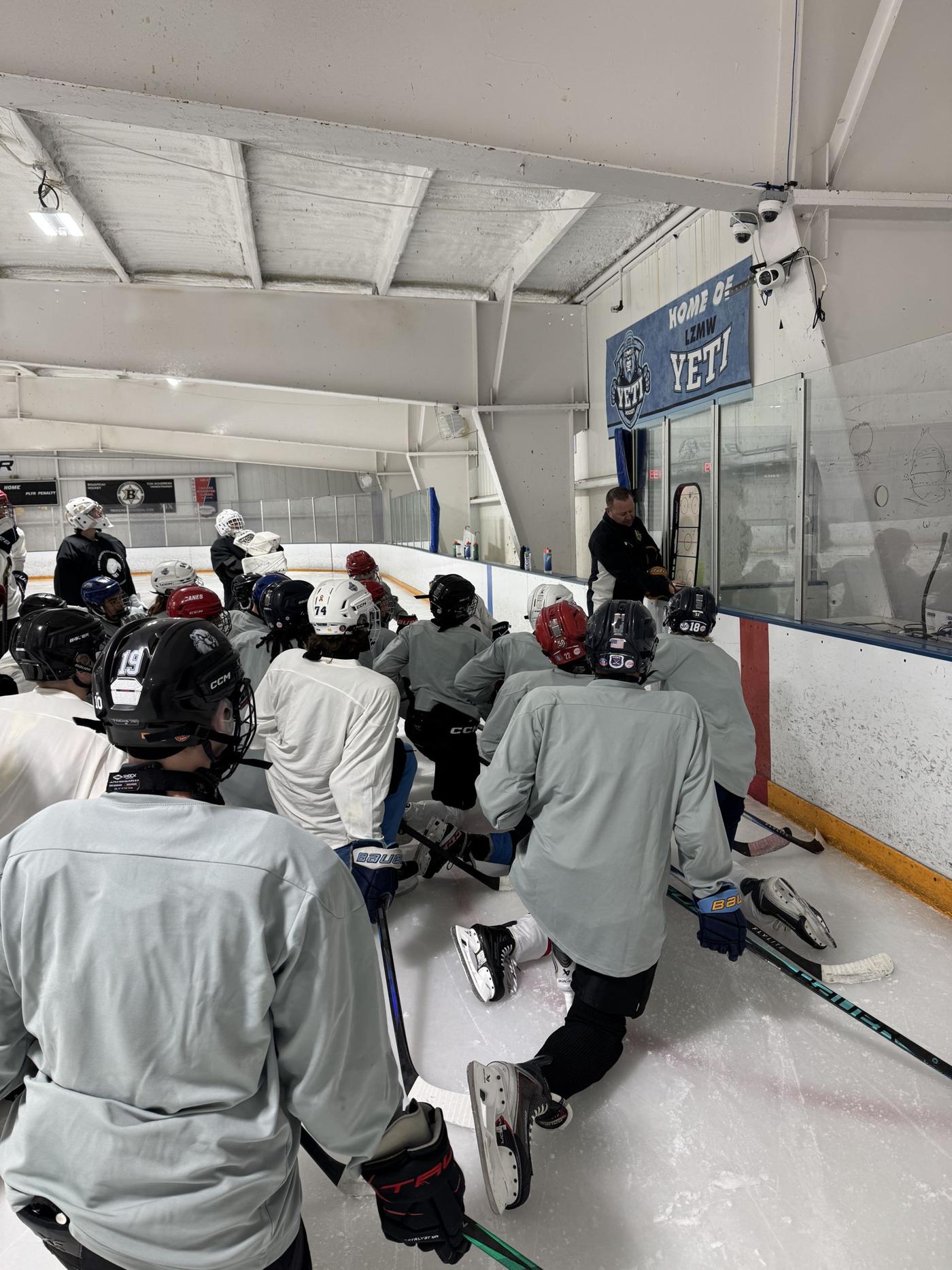 Chris Brooks instructing campers at the boards